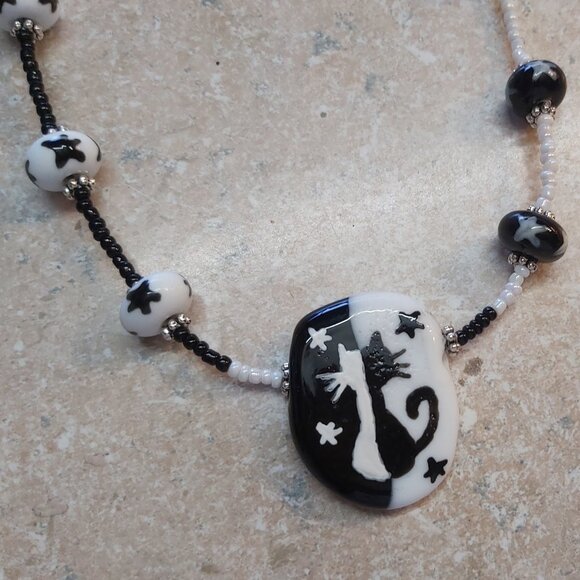 Jewelry - 20" long Lampwork glass ncat necklace with star glass beads